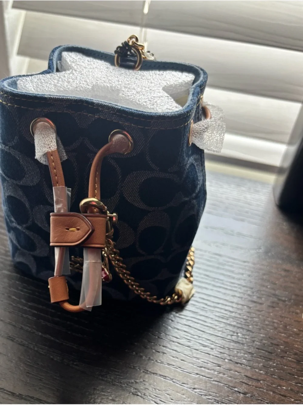 Coach Signature Denim Drawstring Wristlet
Navy Mini Bucket Bag with Gold Chain - Picture 7 of 10